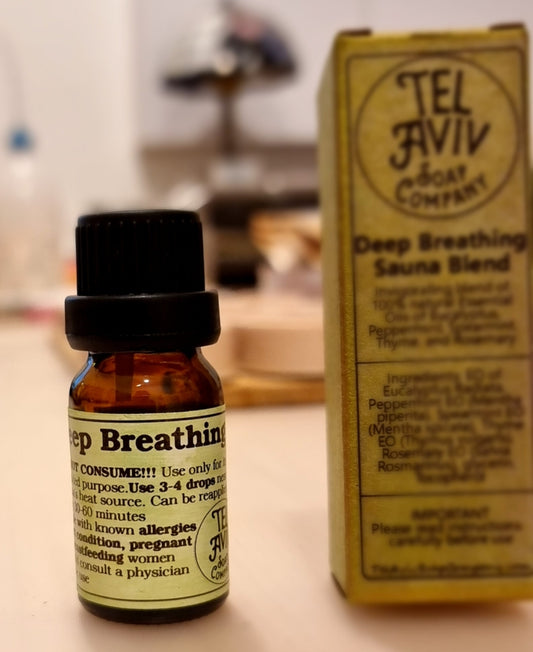 10ml brown glass bottle of Deep Breathing Sauna Blend. along with its cardboard box